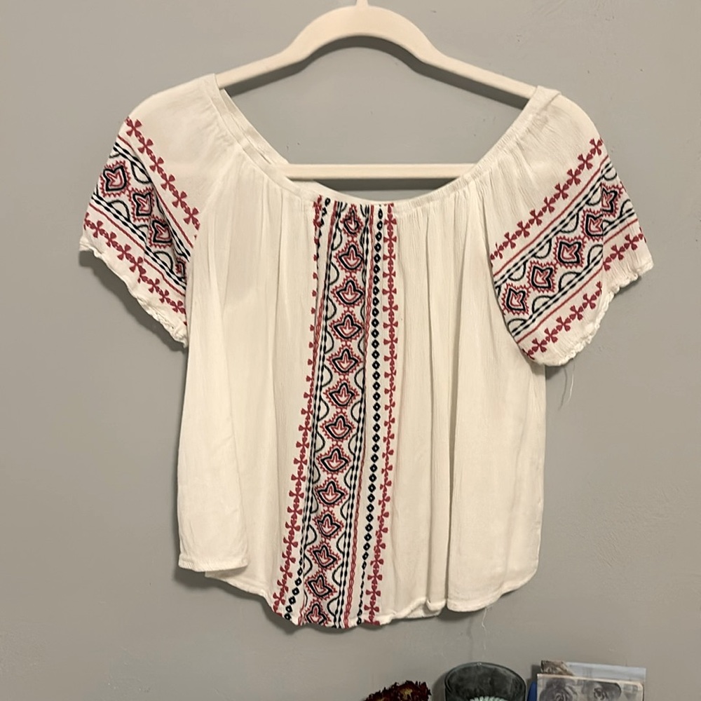 white blouse tee shirt with design